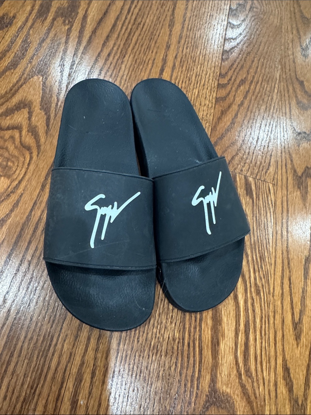 Giuseppe Zanotti Black Slide Sandals with White Signature Logo